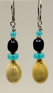 Golden rain top cowry shell earrings