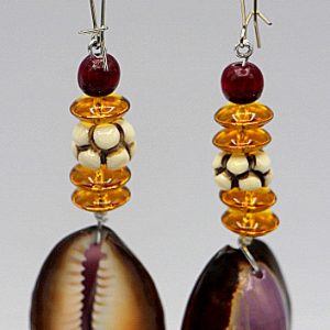 Snake head purple top cowry shell earrings
