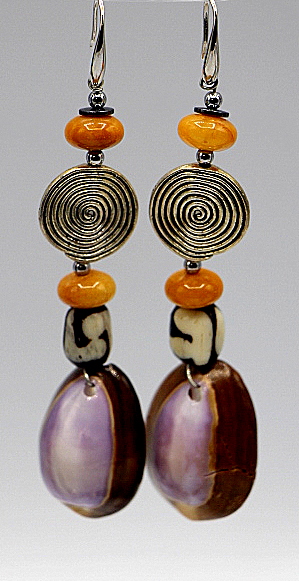 Cowry and mud cloth earrings.